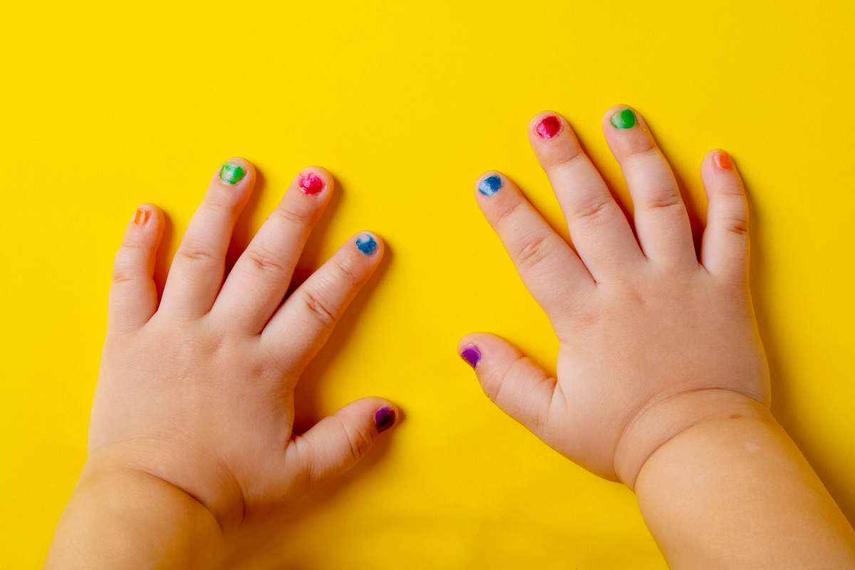 Young fashion concept. Kids nailing, colorful nails, fashion concept